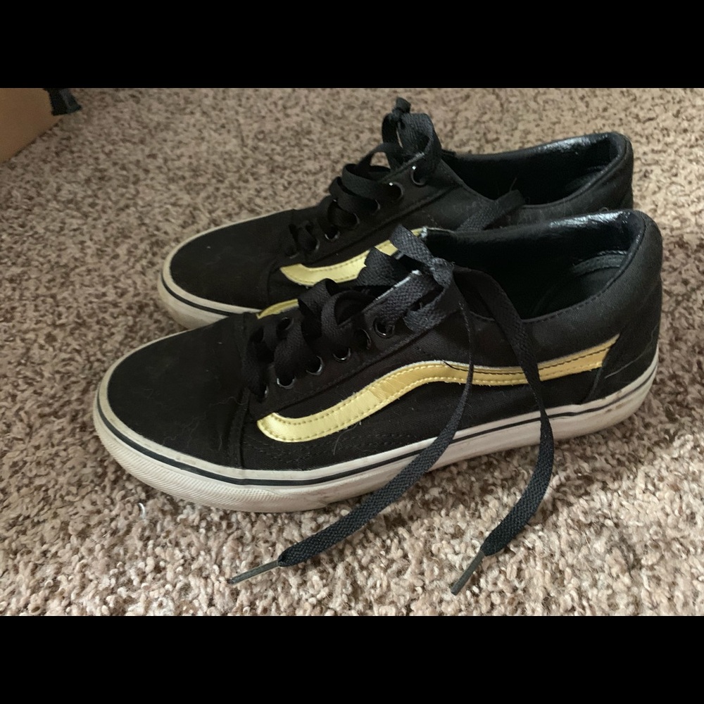 Gold and black vans